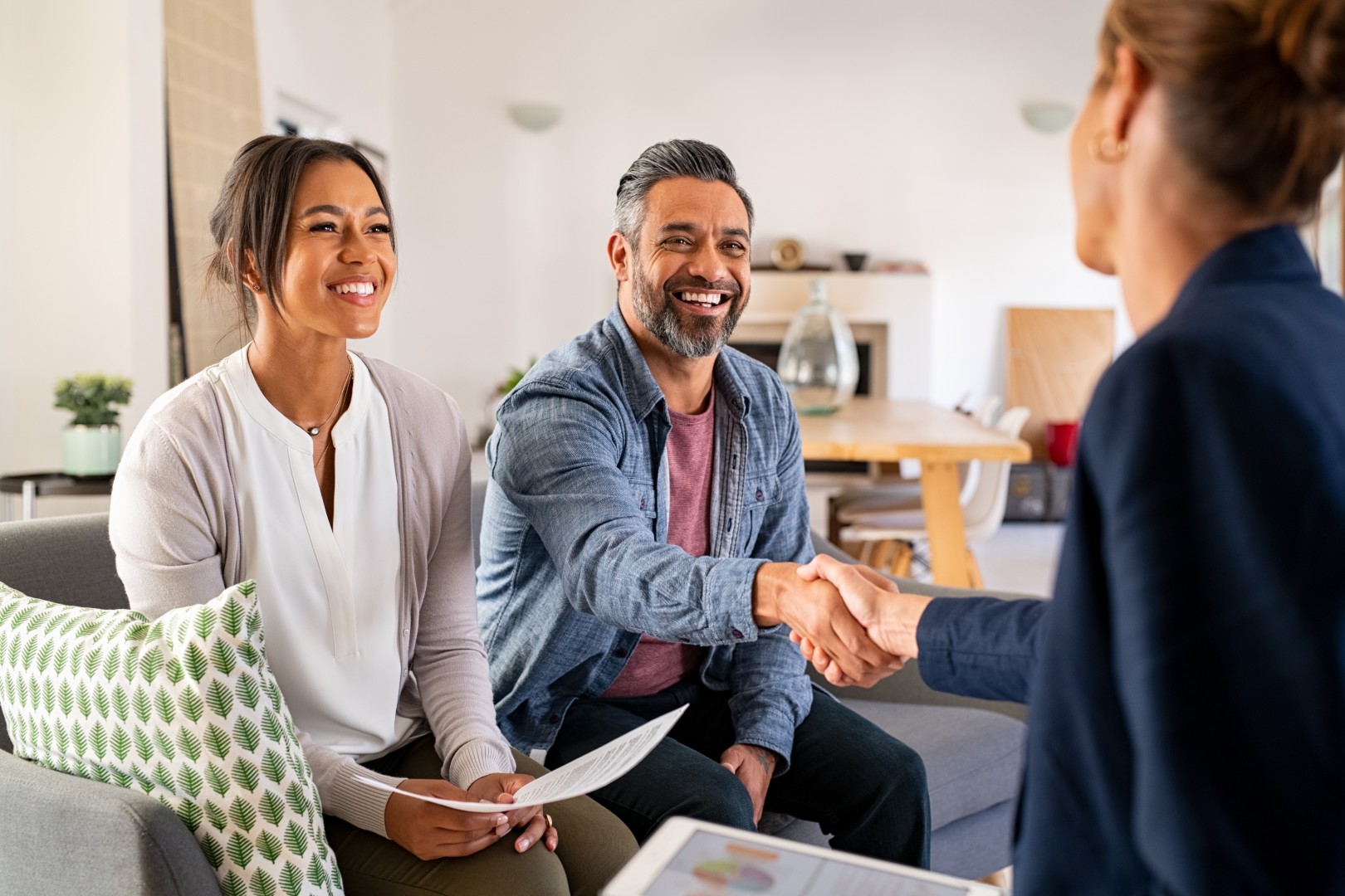 Couple finishing successful meeting